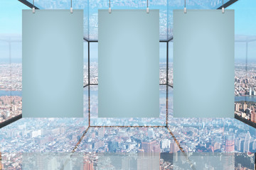 Blank posters in glass room