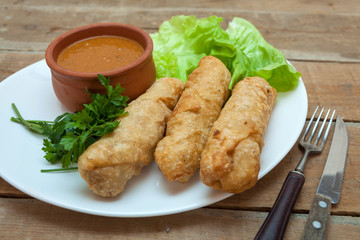 Chicken roll with sauce and vegetables