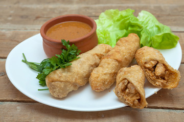 Chicken roll with sauce and vegetables