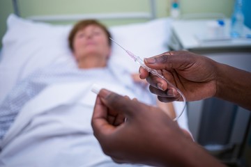 Nurse holding iv drip