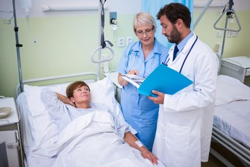 Fototapeta premium Doctor and nurse interacting with each other