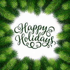 Happy Holidays hand lettering inscription with frame of fir branches