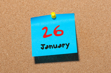 January 26th. Day 26 of month, Calendar on cork notice board. Winter time. Empty space for text