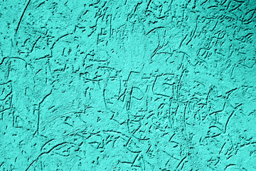 Texture of old vintage turquoise plaster wall