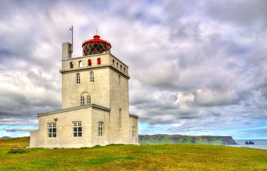 Fototapeta na wymiar Lighthouse at Dyrholaey Cape of Iceland
