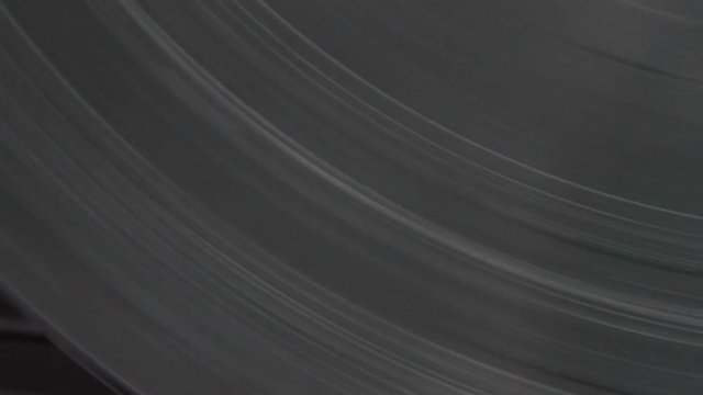Close up of vinyl record on DJ turntable record player