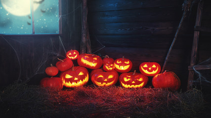 spooky halloween background. scary pumpkin with burning eyes and