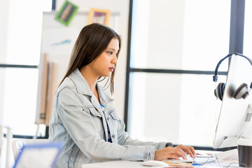 Young woman in office