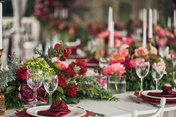  Beautiful wedding table with floral decoration and tableware