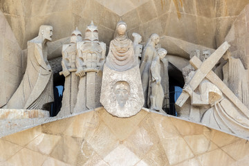 Close view on part of the Sagrada Familia with crucifixion of Christ