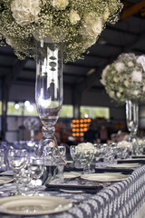 Original flower bouquet on the wedding table