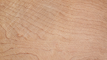 Light brown wood texture with natural pattern. Chopping board or floor surface