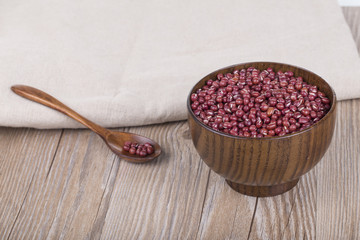 Red Beans in a wooden bowl on the white background
