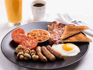 full english breakfast on black plate