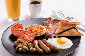 full english breakfast on black plate