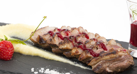 baked goose breast with mashed potatoes and apple sauce