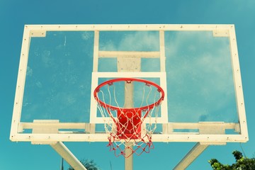 Basketball hoop on a blue sky,color filter