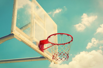 Basketball hoop on a blue sky,color filter