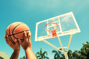 Basketball hoop on a blue sky,color filter