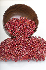 Red Beans in a wooden bowl on the white background