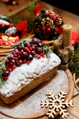Fototapeta na wymiar Homemade christmas cake with wild berries