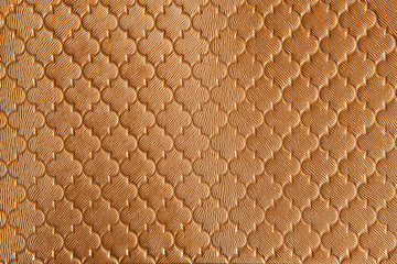 Plastic golden brown background.