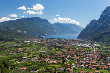 Fototapeta na wymiar Riva del Garda, summer landscape. Blue lake, mountains