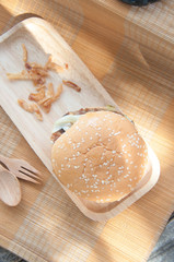 Homemade traditional hamburgers pork in wood tray