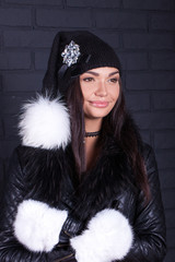 beautiful young woman standing in a hat, cap with bubo, happy, m