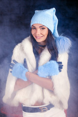 beautiful young woman standing in a hat, cap with bubo, happy, m