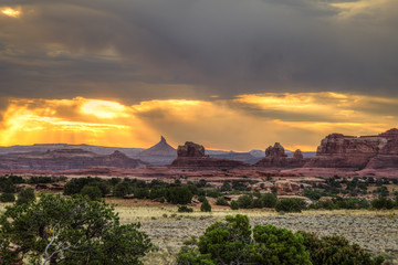 Fototapeta na wymiar Needles District sunrise. Cantonlands National Park-Utah. Every sunrise in the Canyonlands is a magnificent spectacle to behold.