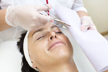 process of massage and facials in beauty salon