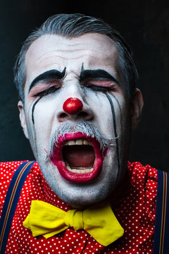 Terrible crazy clown and Halloween theme