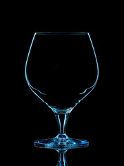 Silhouette of blue whiskey glass with clipping path on black background.