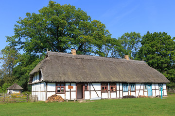 Fototapeta na wymiar Kluki in polish Pomerania -wooden traditional cottage
