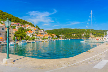 Adriatic bay Pucisca Brac. / View at picturesque bay in town Pucisca, mediterranean place on Island Brac, Croatia.