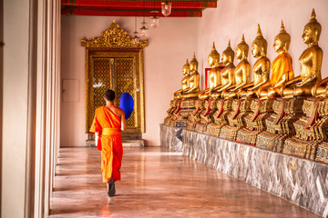 Bangkok, Thailand - May, 19, 2013 : Buddhist monks walking among