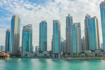 Naklejka premium Skyscrapers skyline of Old Town Island around the Burj Khalifa Lake near the Dubai Mall in Dubai Downtown.
