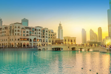 Scenic view of Burj Khalifa Lake, a pool where they dance the Dubai Fountain. On background, the...