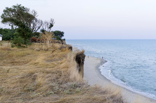 Cliff and sea beach. The Black Sea beach of Lebedivka, Ukraine - Stock image