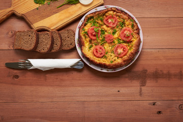 bread, scrambled eggs on a table