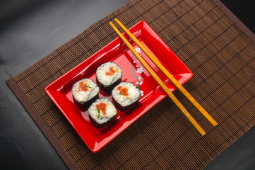 still life - set the rolls on a red plate