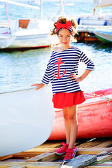 young girl with the boat