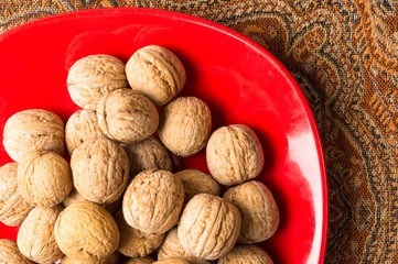 walnuts in red plate