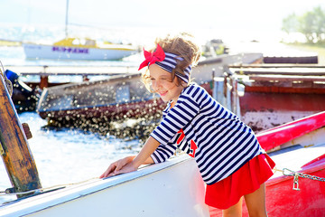 young girl with the boat