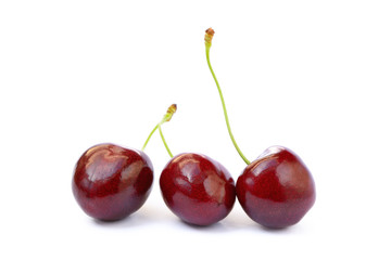Tasty ripe cherries isolated with white background