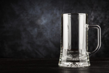 Beer mug on black background
