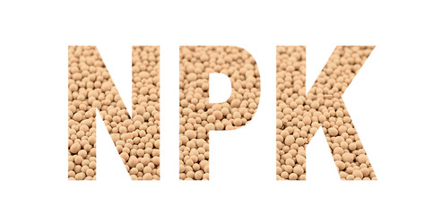 NPK letters made of composite mineral fertilizers. Selective focus