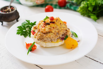 Squash stuffed with vegetables and meat.