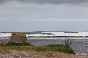 Cloudy autumn day on the Atlantic coast. Doughmore beach, Ireland.